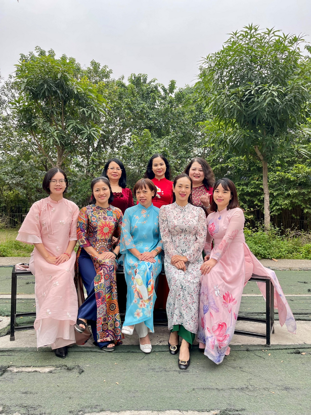 A group of women posing for a photoDescription automatically generated